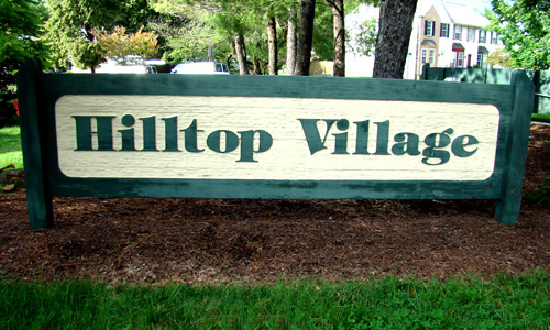 Hilltop Village entry sign