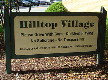 Hilltop Village parking and driving sign